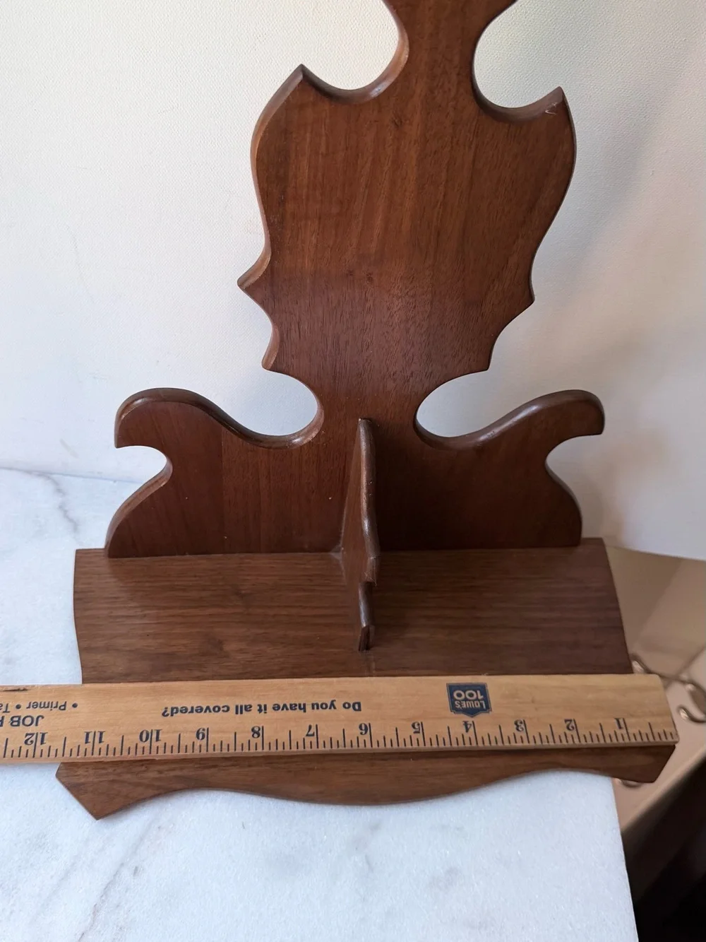 vintage wall sconce shelf made of carved wood with a dark finish